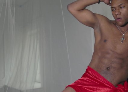Black man in bed sensual movements